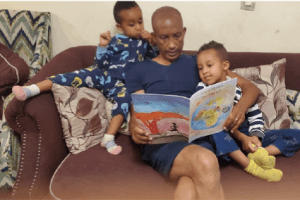 Yoseph Reading to Sons