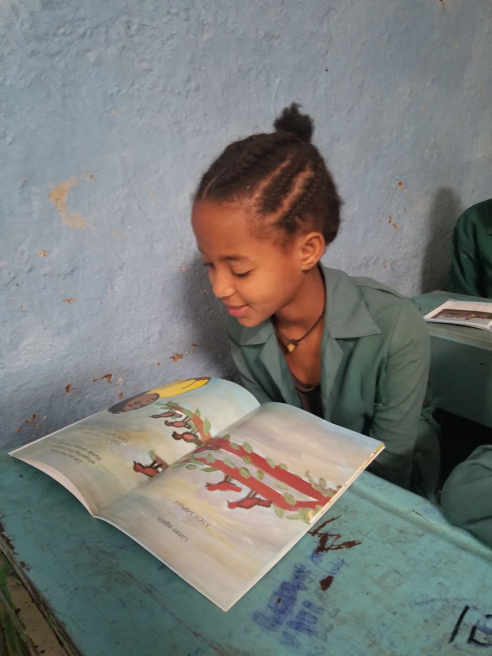 2022-04-LIT-Book-Distribution-Corvallis-Ready-Set-Go-Kebele-02-pupils-books-reading-8